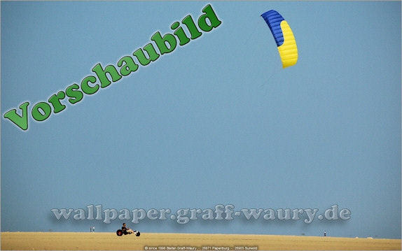 Vorschau zum kostenlosen, lizensierten Wallpaper-Bild: Insel Borkum - der Kite-Buggy-Fahrer